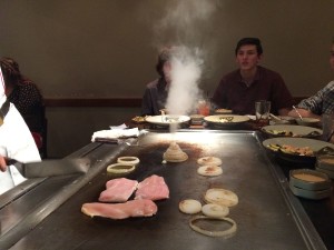 The chefs at Benihana often stack onion rings into a volcano like figure and make it steam through the center like a volcano would.