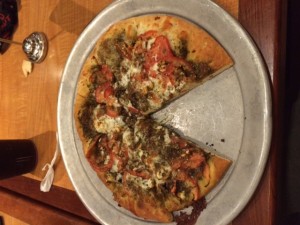 Waterfront's Mid-East Pizza is topped with mozzarella, feta-cheese, tomatoes, and zatar which all contribute to a savory taste.