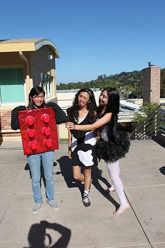 Three Carlmont students showing off their costumes