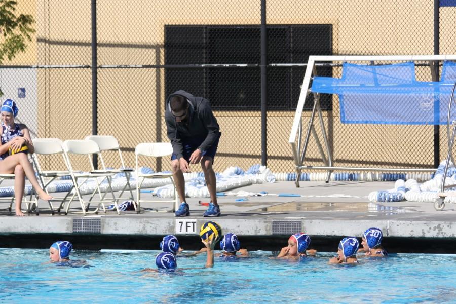 Girls varsity water polo moves up