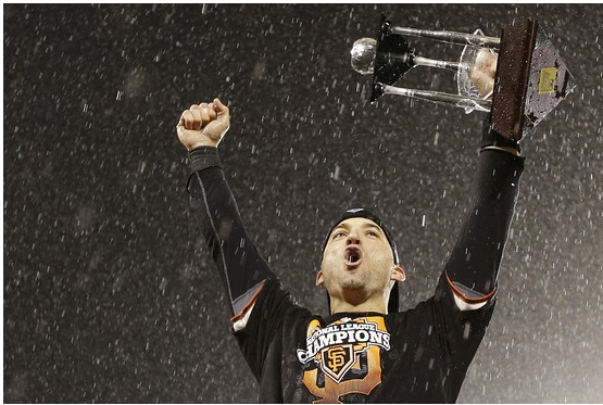 Giants second baseman Marco Scutaro celebrates his teams series win.