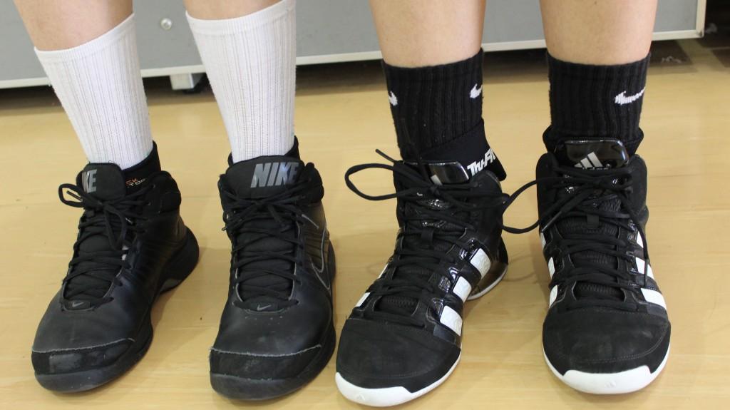 Caslows+basketball+players+wear+compression+sleeves+on+their+ankles+to+prevent+running+injuries+before+they+occur.
