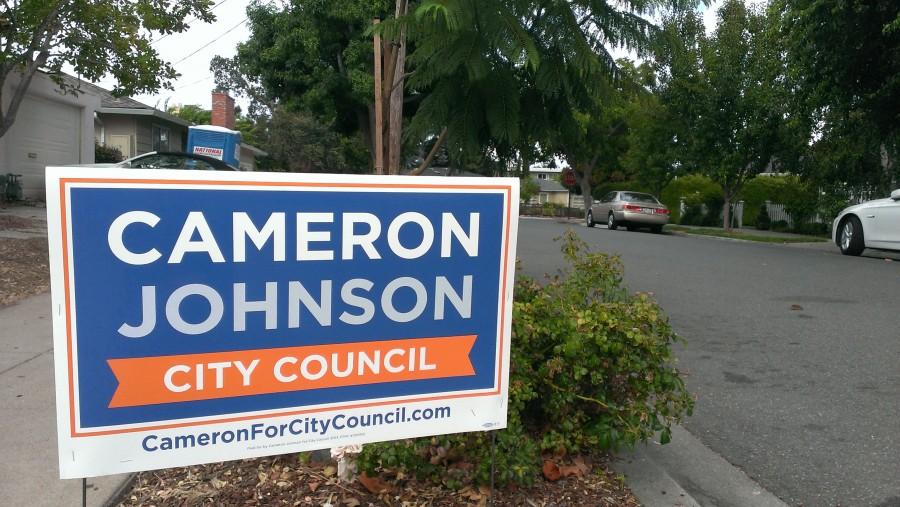 Interns put out lawn signs during the election