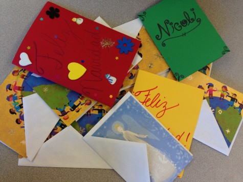 Feminist club makes Christmas cards to send to a safe house in Costa Rica.