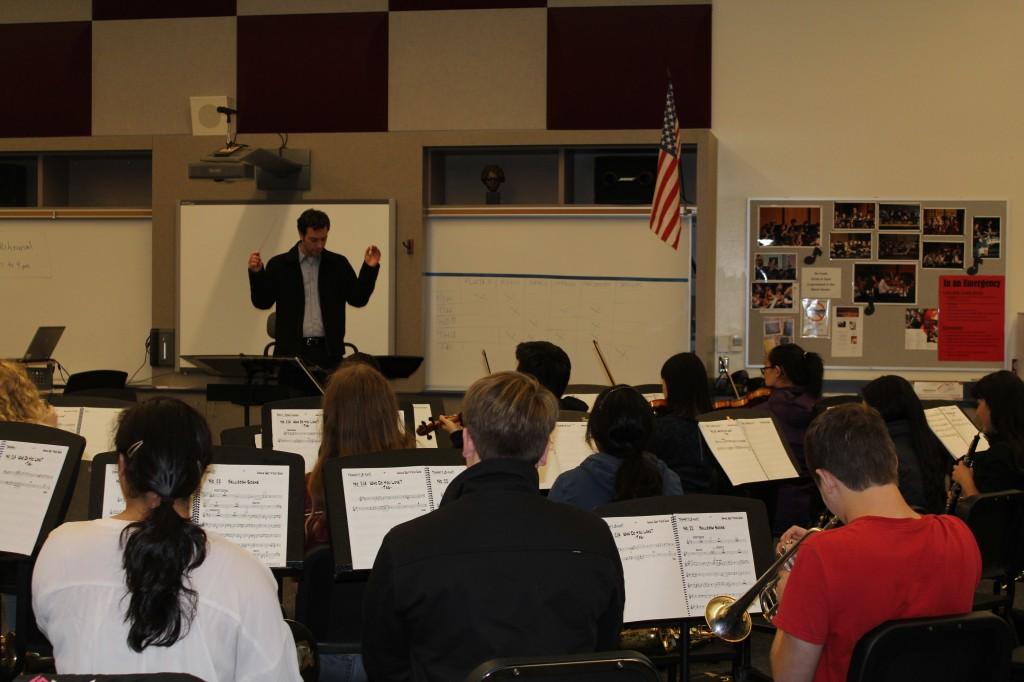 Conductor Edward Smart rehearses with Pit Orchestra for Annie Get Your Gun.