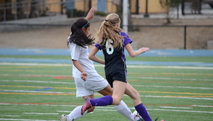 Manzanares fighting for the ball against Sequoia high school.