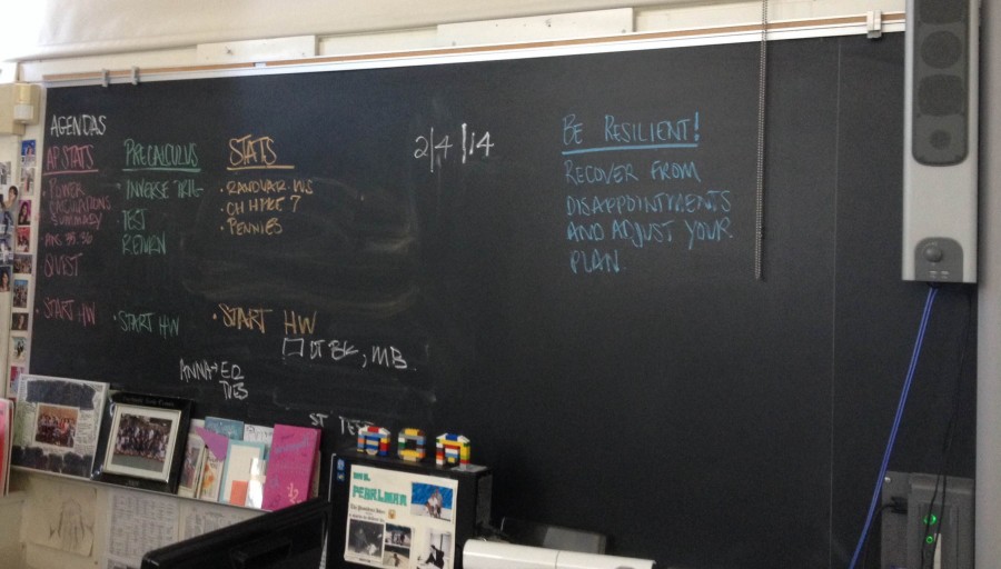Pearlmans chalkboard full of homework reminders for her three classes. 