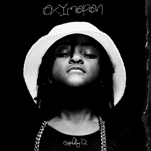 Schoolboy Qs cover art for the album Oxymoron featuring his daughter.