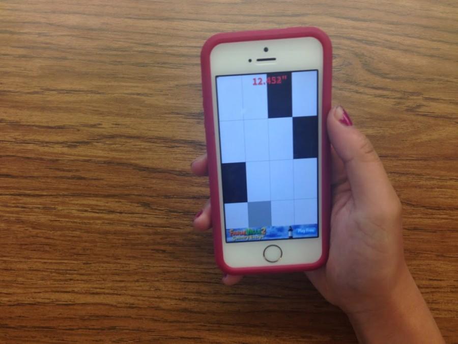 A Carlmont High School student plays the new app, Dont Tap the White Tile.