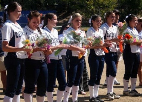(From left to right,) Rebecca Faulkner, Gabriella Pons, Danielle Giuliacci, Christy Peterson, Missy Pekarek, Katelyn Bacciocco, and Madi Chang all smiled with their flowers on senior day.