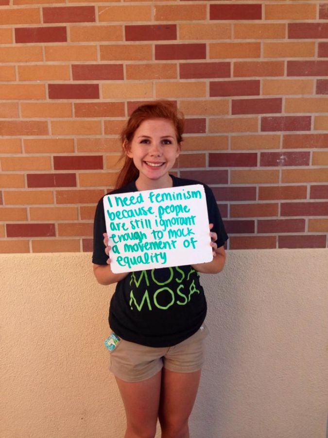 Claire Porter, a Carlmont graduate, poses with a sign explaining why she needs feminism. Photo provided by Claire Porter.