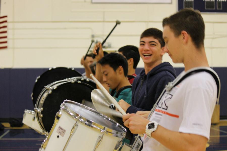 Drumline+members+have+fun+as+they+practice+for+their+upcoming+performances.