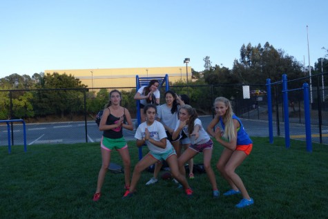 The Sophomore Powder Puff team strikes a pose after practice
