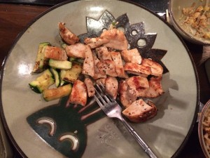 The chicken and zucchini dish was filled with flavor and seasoning.