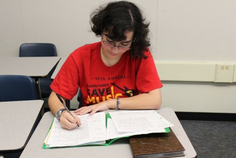 Junior Rebecca Medina takes good notes to help her graduate a year early. 