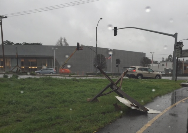 This sign post lost its battle against rain and wind