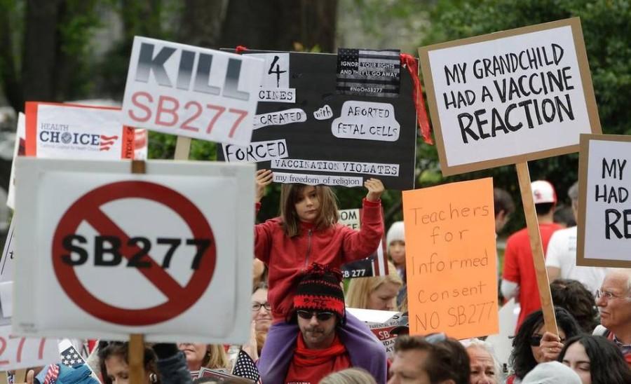 Protesters rally against legislation requiring California schoolchildren to get vaccinated.