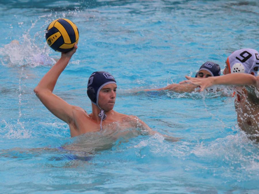 Junior David Vondran winds up for a shot against the Half Moon Bay Cougars at Carlmont on Tuesday.