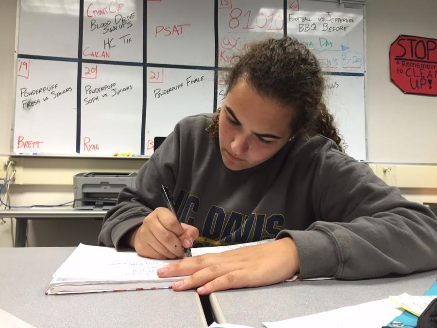 Junior Kimberly Lane, working hard on homework after school, said, Having late start would be really beneficial to me, and I hope they do proceed with it.