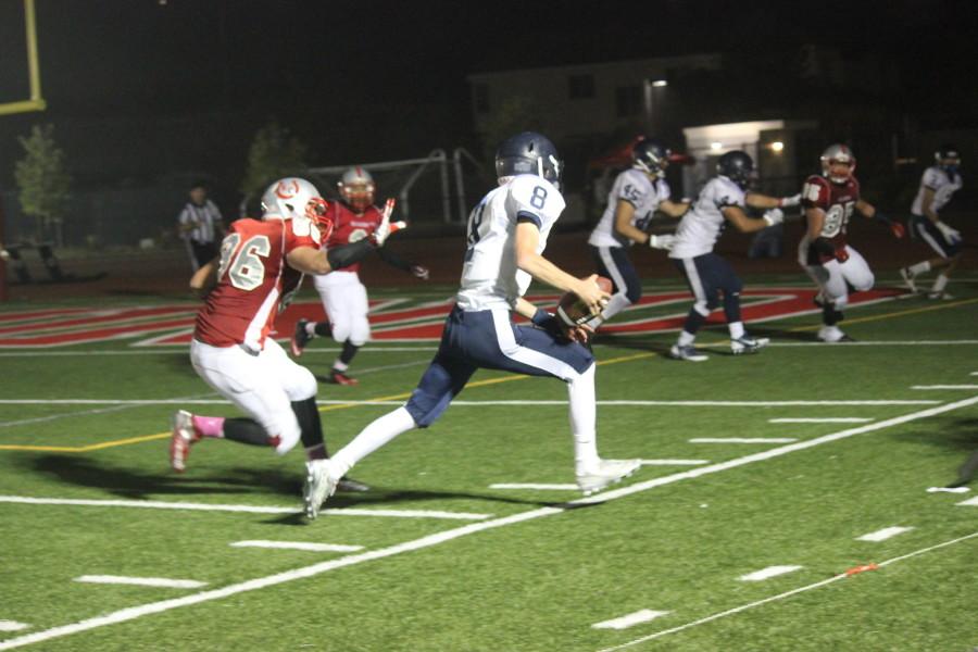 Sophomore quarterback Timmy Palthe going for the touchdown. 