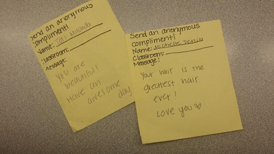 Students are given a piece of paper so that they can send compliments to a friend for free.