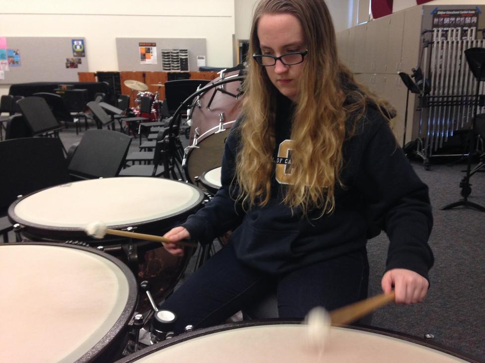 Sophomore Jenna Williamson practices the timpani during lunch. Williamson said, I started playing music when I was in third grade after I saw these twin girls who were really good, so I got jealous and wanted to be a pianist. It was fun even though I wasn’t a great pianist, but that propelled me to do more music.
