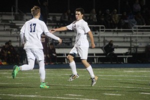 Collins congratulates Fitzpatrick for scoring a goal for Carlmont. 