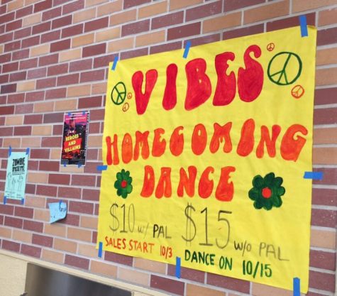 ASB puts up posters advertising the homecoming dance, which will take place on Oct. 15. 