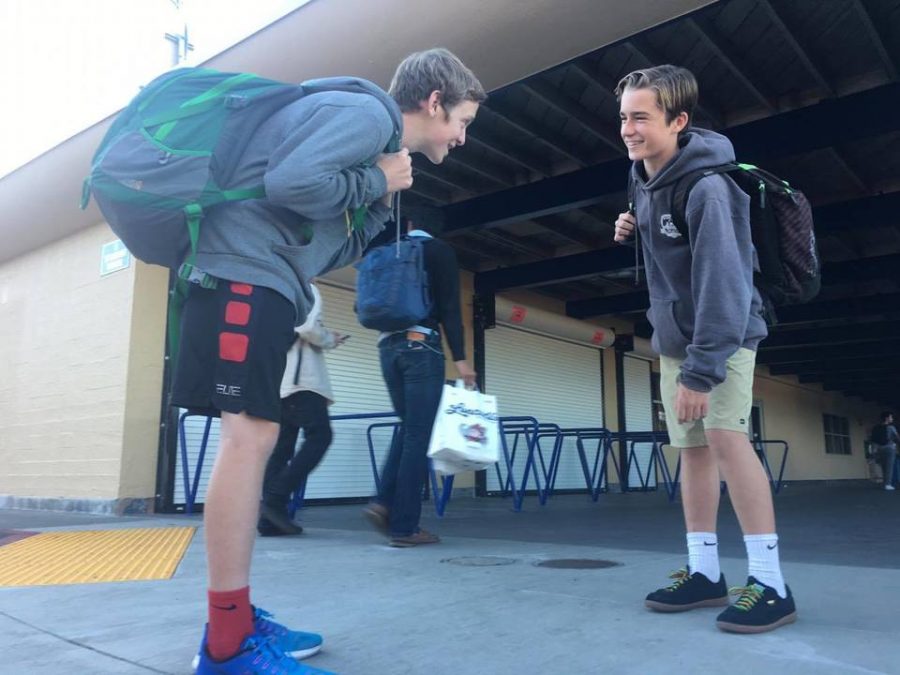 Freshmen Tyler Dartnell and
Parker English fill their backpacks with books to study for finals.