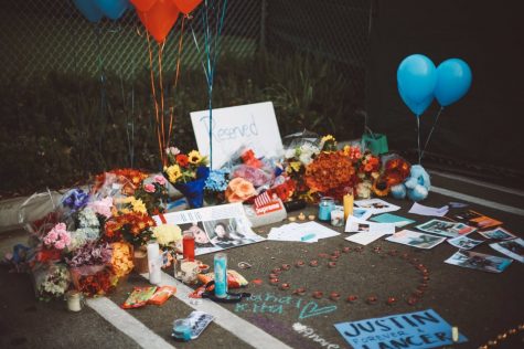In the Saint Francis parking lot, students created a memorial for Justin Quintos.