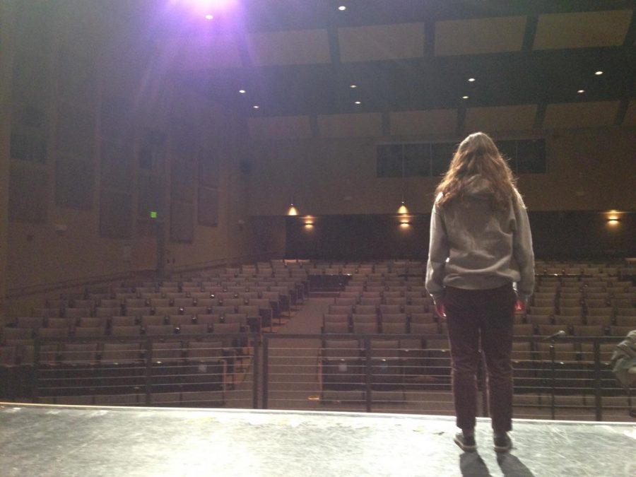 Meilene Jones, a junior, practices performing on stage in Carlmont’s performing arts center.
