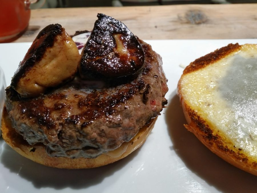 The foie gras sit upon the kobe beef, while the winter truffles leak flavor into the translucent cheese.