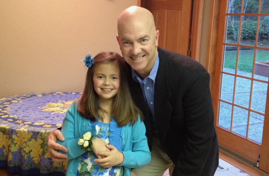 Mike Davies and his, at the time, 9-year-old daughter Senna pose for a photo before the Father-Daughter Sweetheart Dance.