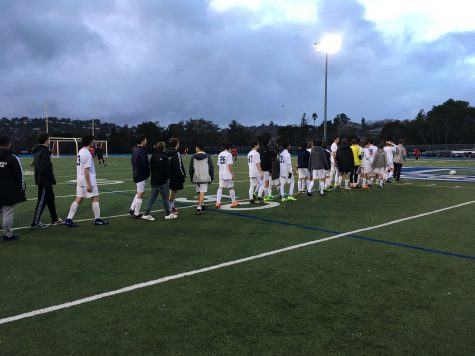 JV Boys Soccer lines up to shake hands with Aragon after a 5-1 defeat.