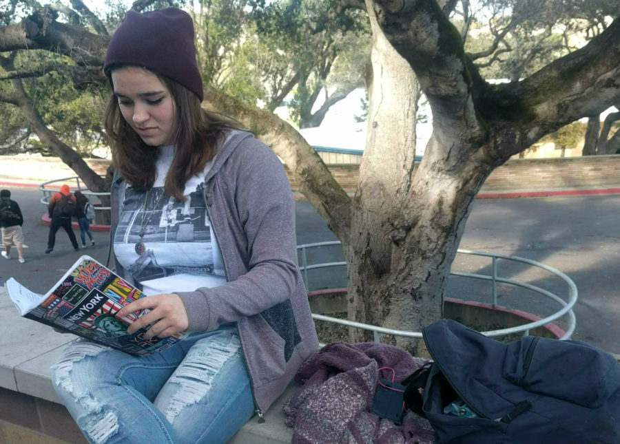 Savanna Rose Dillon sits and rereads her poetry she has written this past school year. 