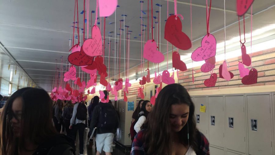 Students search for the valentine, provided by ASB, with their name on it.