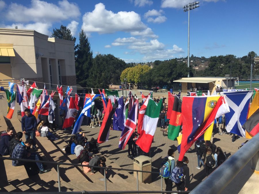 Flags in the quad represent all students at Carlmont
