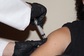 Your best defense against influenza is to receive an annual vaccination, said the Mayo Clinic. Each year, doctors give patients flu shots to prevent people from  catching the flu. 