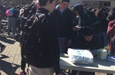 Students fill the quad as the clubs start selling food at the Heritage Fair.