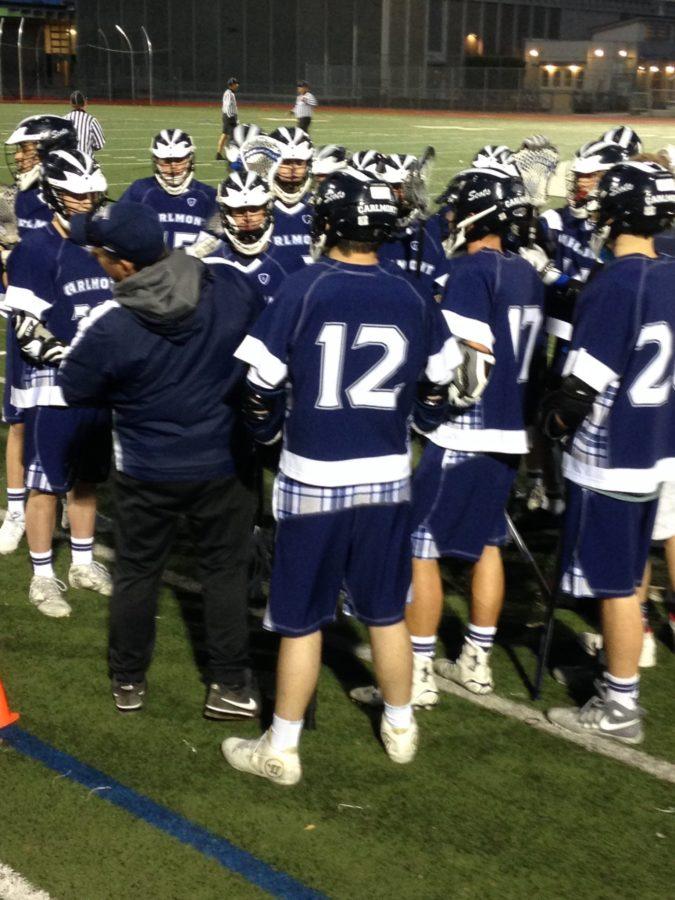 Coach Todd Irwin tries to pump up his team in the first half against Burlingame.