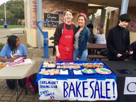 Sophomores Will Nadan and Jade Margolis sell a variety of baked goods to fundraise for their club at Open House.