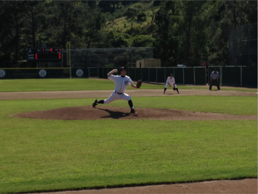Jason Korjeff, a sophomore, pitches in the first inning of the Scots 13-1 victory.