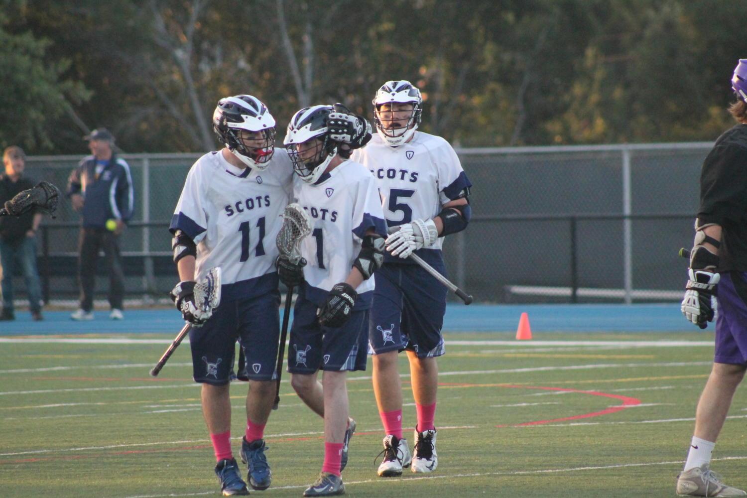 Carlmont players congratulate senior Jack Morris on a goal against Sequoia. 