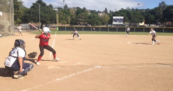 Freshman Alisilani Alusa pitches to sophomore catcher Grace Heck.
