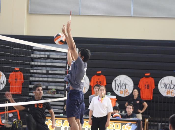 Haider blocks the ball against the Bearcats. 