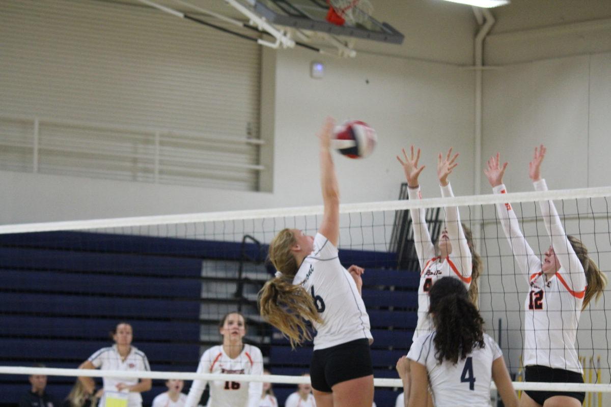 Vanoncini spikes the ball over the net, earning a point for the Scots.