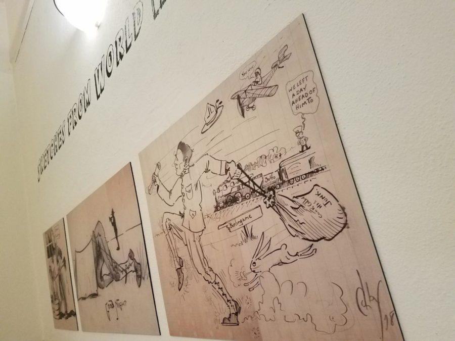 Various sketches hang from the rotunda walls depicting soldier Alvin Colby's daily life while deployed during World War One.