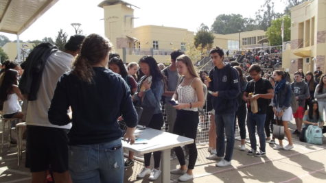 Carlmont students line up in the quad during the one-day homecoming ticket sale to buy their discounted tickets on Oct. 16. Tickets were sold for $5 cheaper than the normal prices on Oct. 17 to Oct. 27.