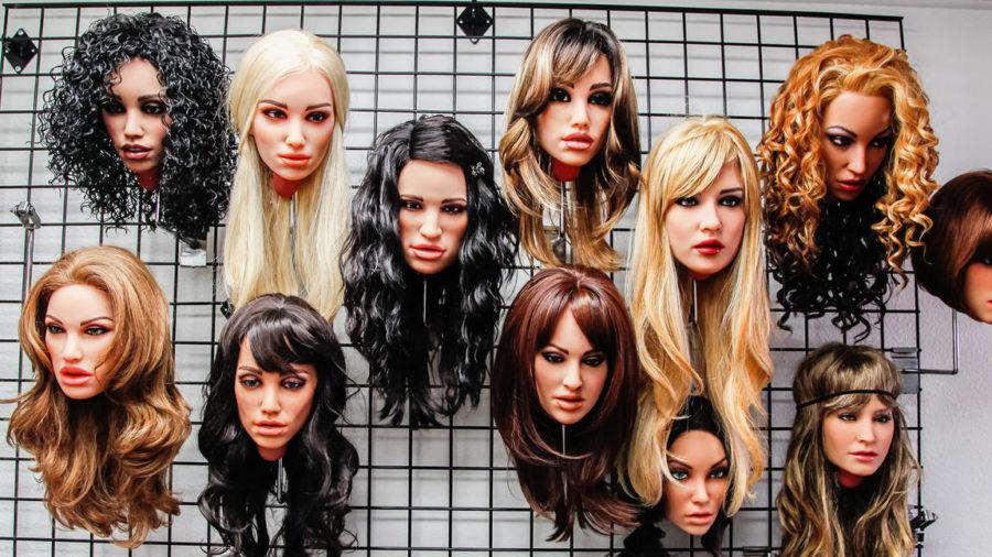 RealDoll heads, which will soon be transformed into full robots, on display in the showroom of Abyss Creations in San Marcos, California.
