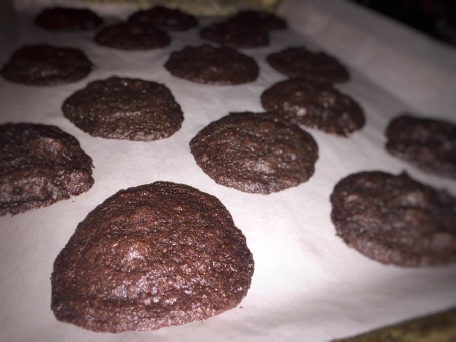 A pan of freshly baked triple chocolate chip brownie cookies, a recipe used by Baking Club, ready to eat. 